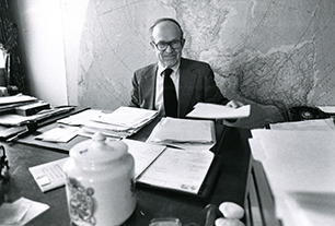 Photograph of Guthrie Birkhead at his desk