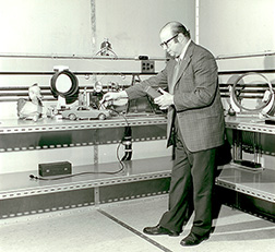 Photograph of Professor Ginsburg working with toys