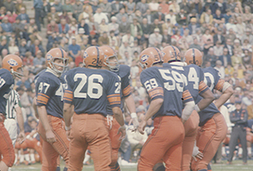 Slide of Football Team Huddle, 1969