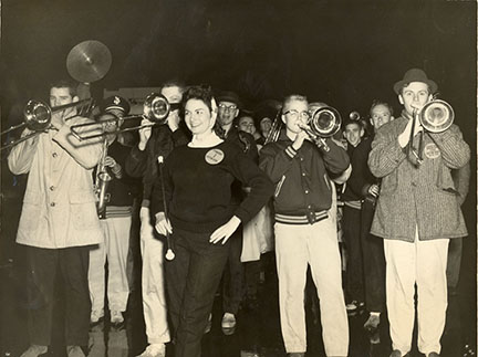Photograph of members of the marching band and majorette at a 1960 Cotton Bowl rally