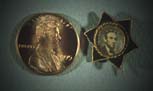 Small Lincoln Star pin and penny