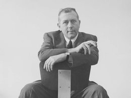 black and white headshot photo of Marcel Breuer sitting in a chair